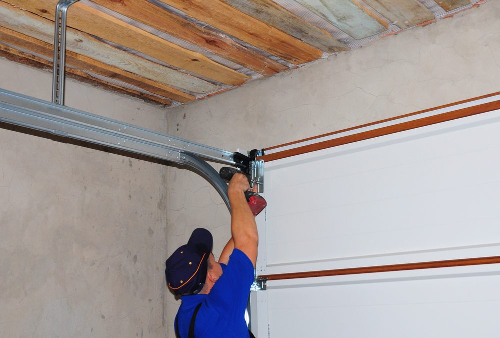 how to put garage door back on track